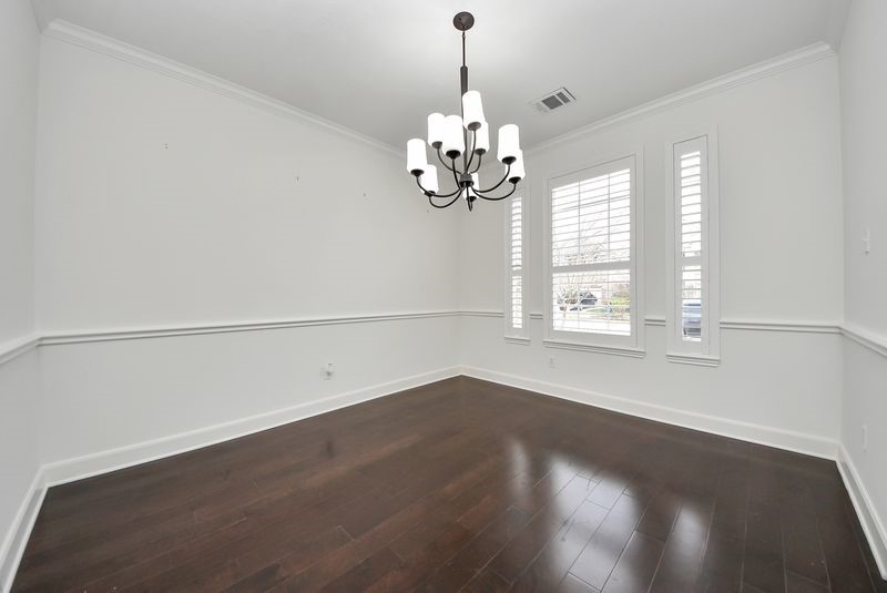 20831 Deauville Drive Spring, TX 77388 - Photo 5 of 42 Formal dining room with chandelier & chair rail moldings
