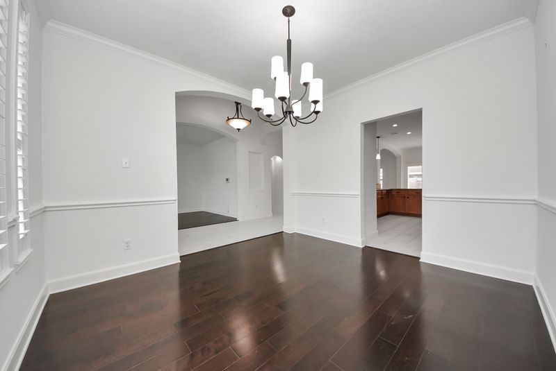 20831 Deauville Drive Spring, TX 77388 - Photo 6 of 42 View of the formal dining room looking into the kitchen and entry hallway
