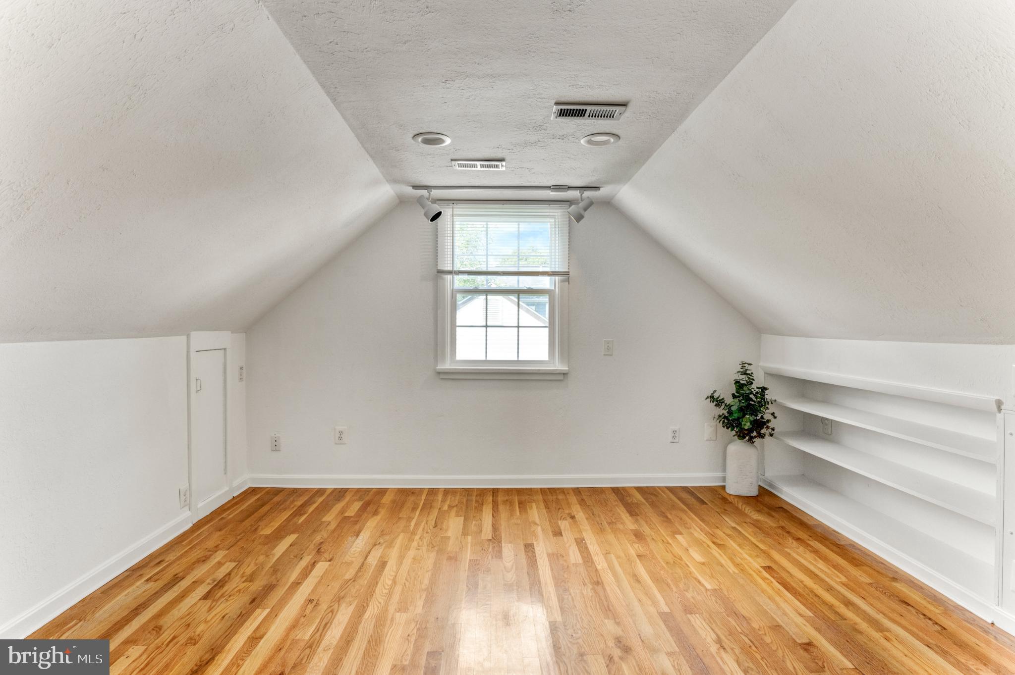 3106 Burgundy Road Alexandria, VA 22303 - Photo 13 of 24 wooden floor in an empty room