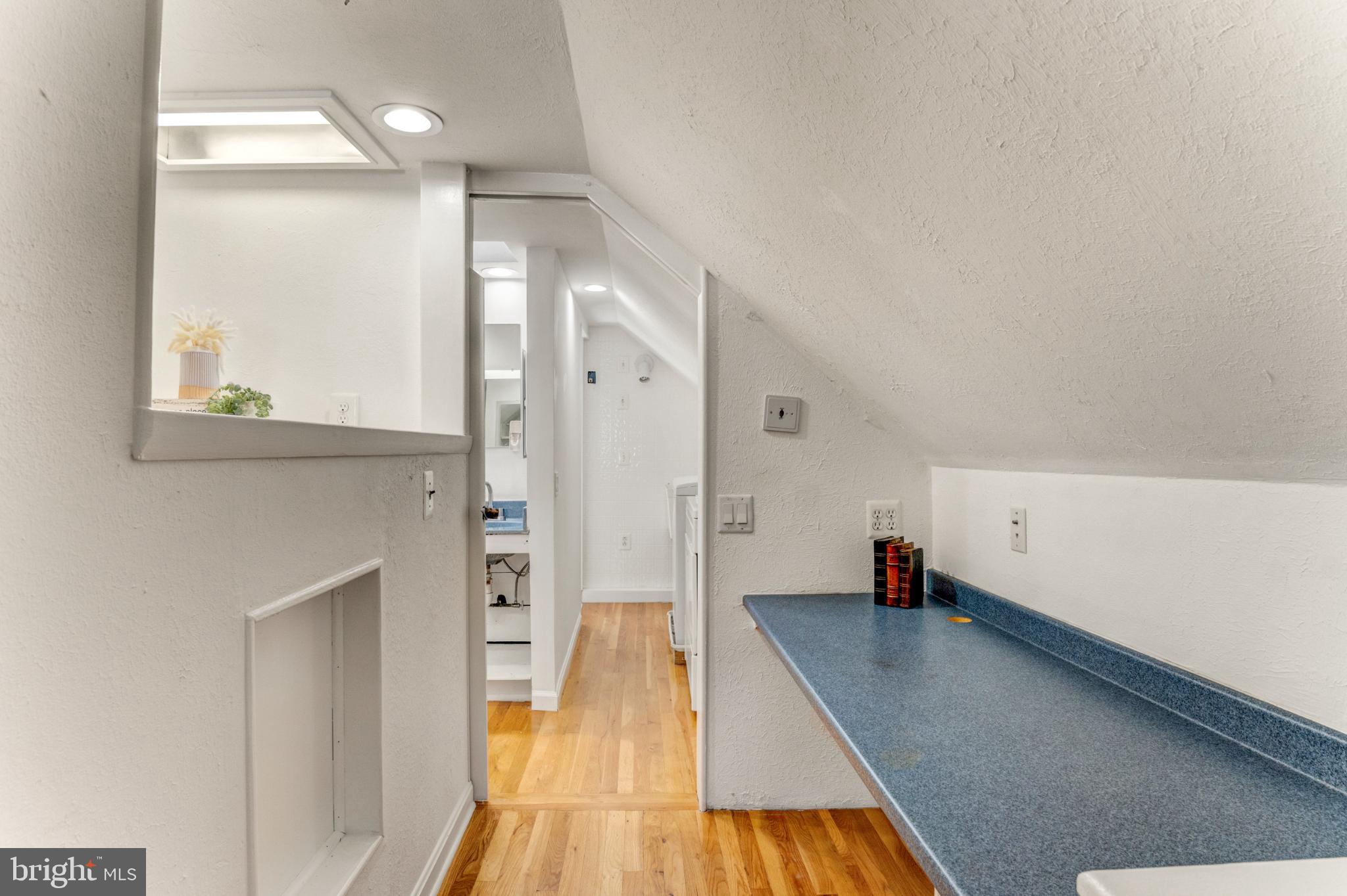 3106 Burgundy Road Alexandria, VA 22303 - Photo 15 of 24 a view of an empty room and wooden floor