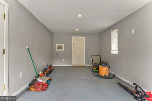 a room with toys and hard wood floor