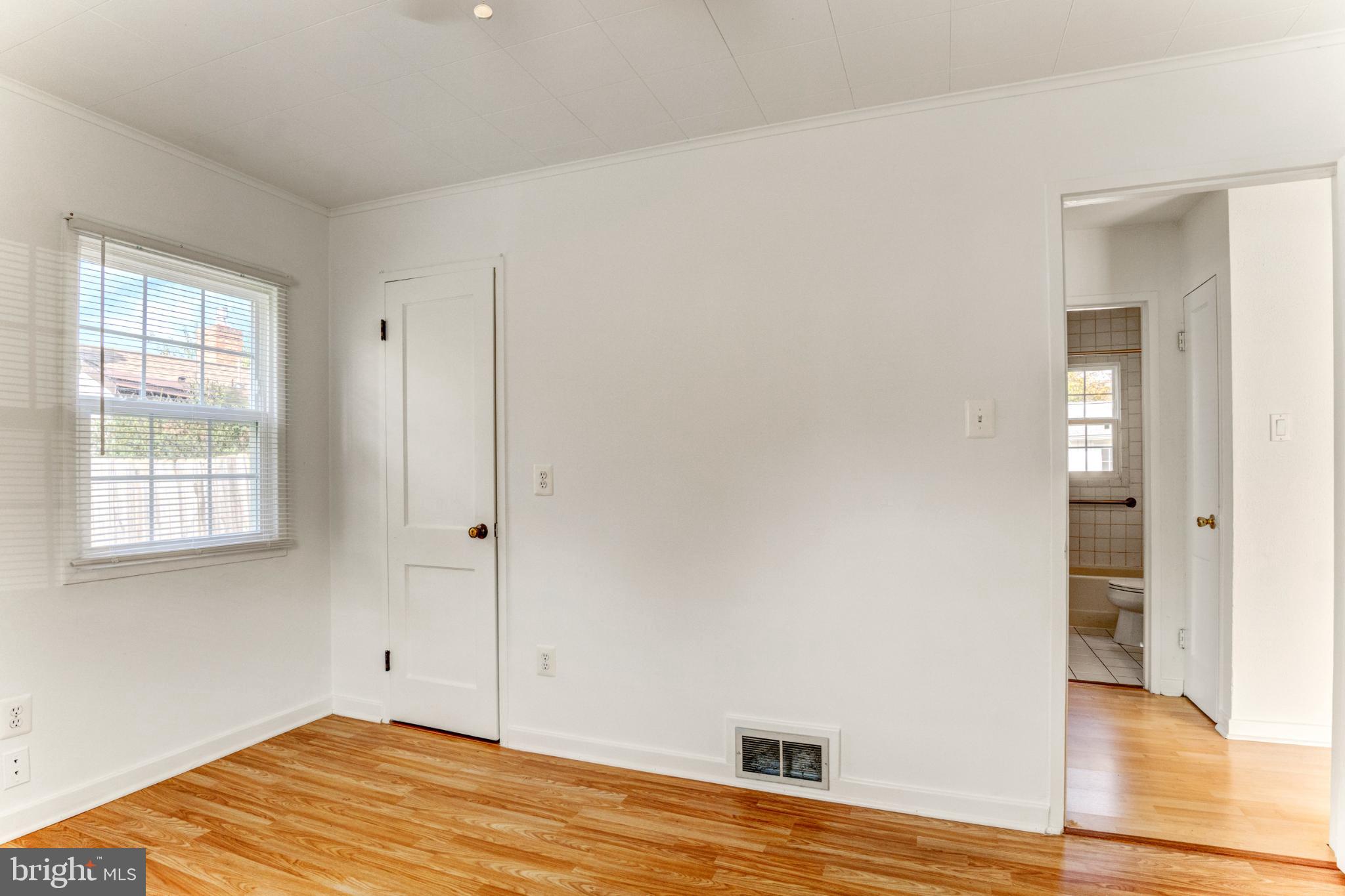 3106 Burgundy Road Alexandria, VA 22303 - Photo 9 of 24 a view of empty room with wooden floor