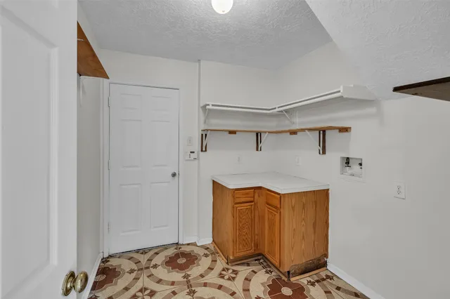 a bedroom with bed and a window