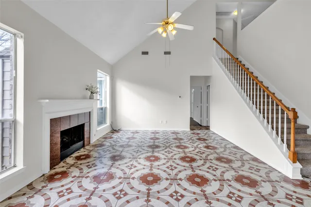 a view of a room with window and fireplace