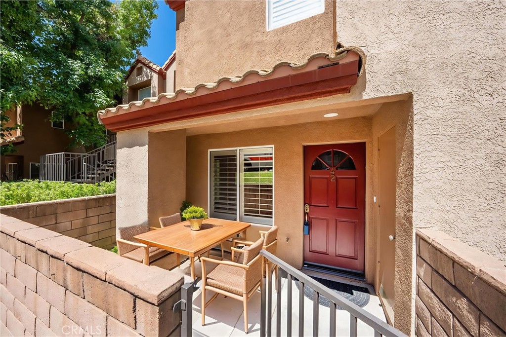 22713 Copper Hill Drive, Unit 42 Saugus, CA 91350 - Photo 4 of 32 a view of house with outdoor seating space