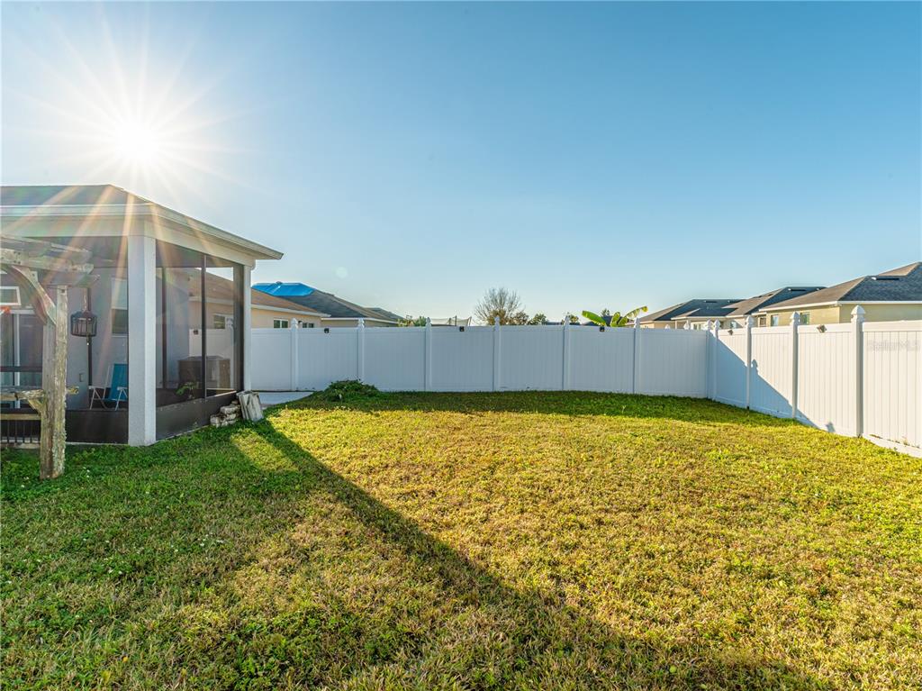 4504 Orchard Grove Road St. Cloud, FL 34772 - Photo 28 of 29 a view of a backyard