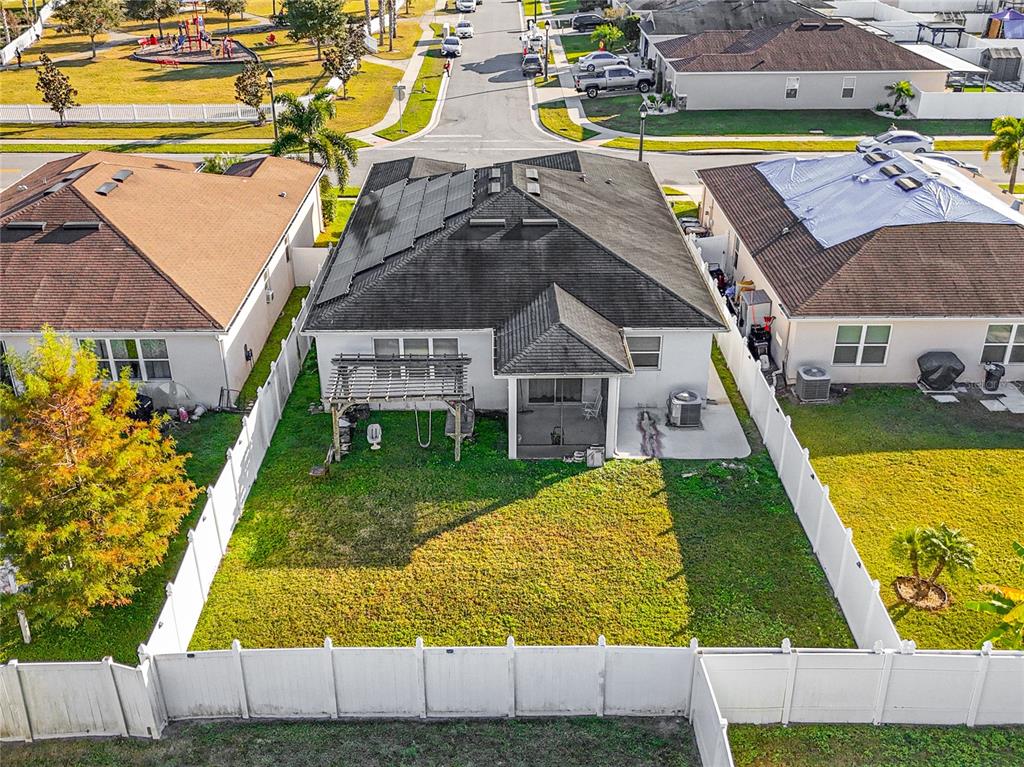 4504 Orchard Grove Road St. Cloud, FL 34772 - Photo 7 of 29 a view of a house with a swimming pool