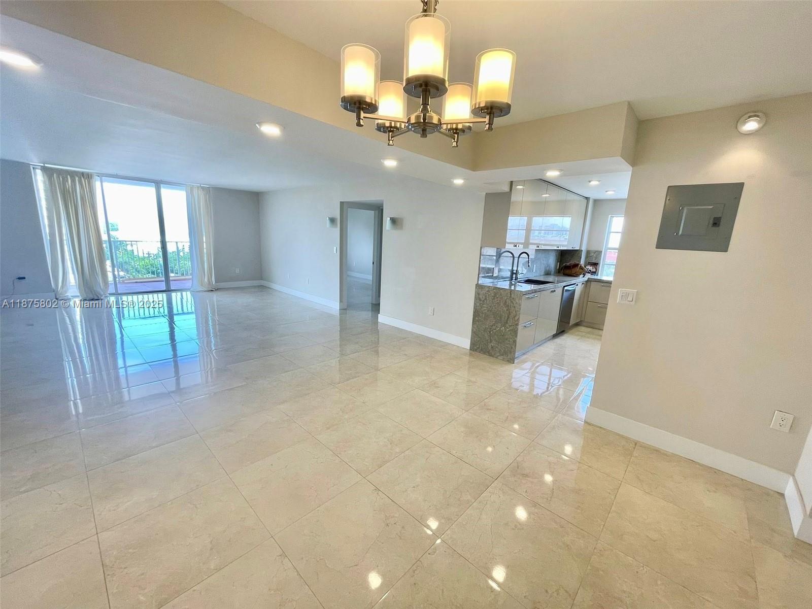 2851 Northeast 183rd Street, Unit 802E Aventura, FL 33160 - Photo 3 of 37 a view of a kitchen and a window