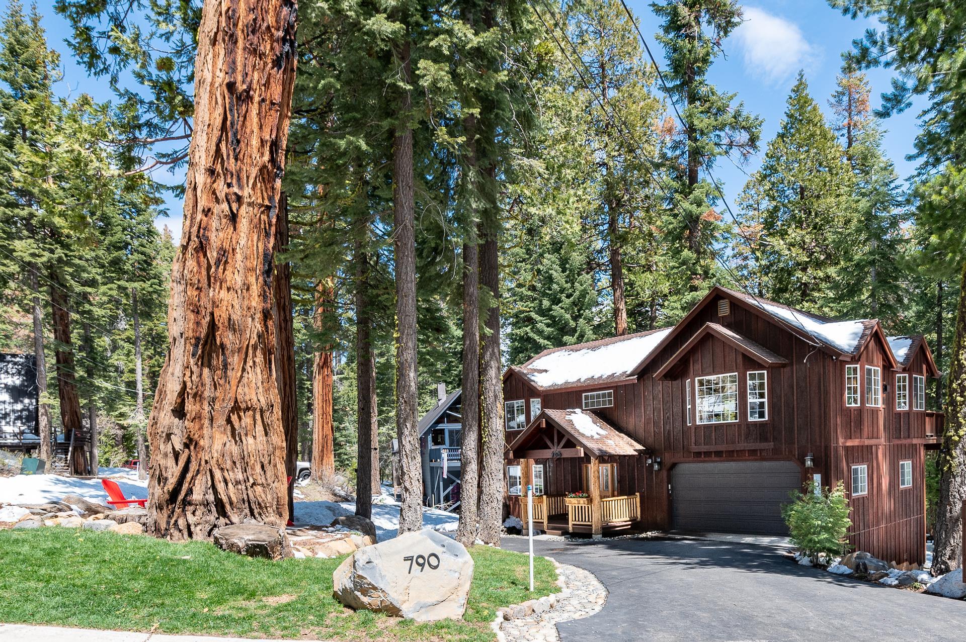 790 Sugar Pine Road Homewood, CA 96141 - Photo 18 of 21 a front view of a house with garden