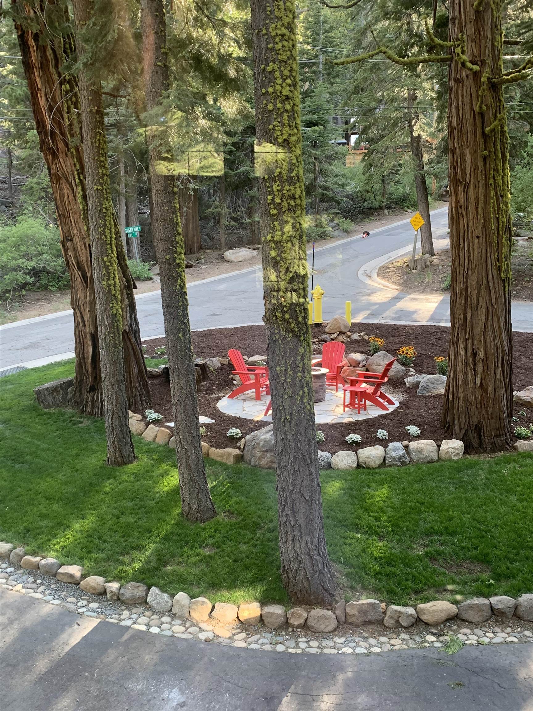 790 Sugar Pine Road Homewood, CA 96141 - Photo 20 of 21 a front view of a house with a yard