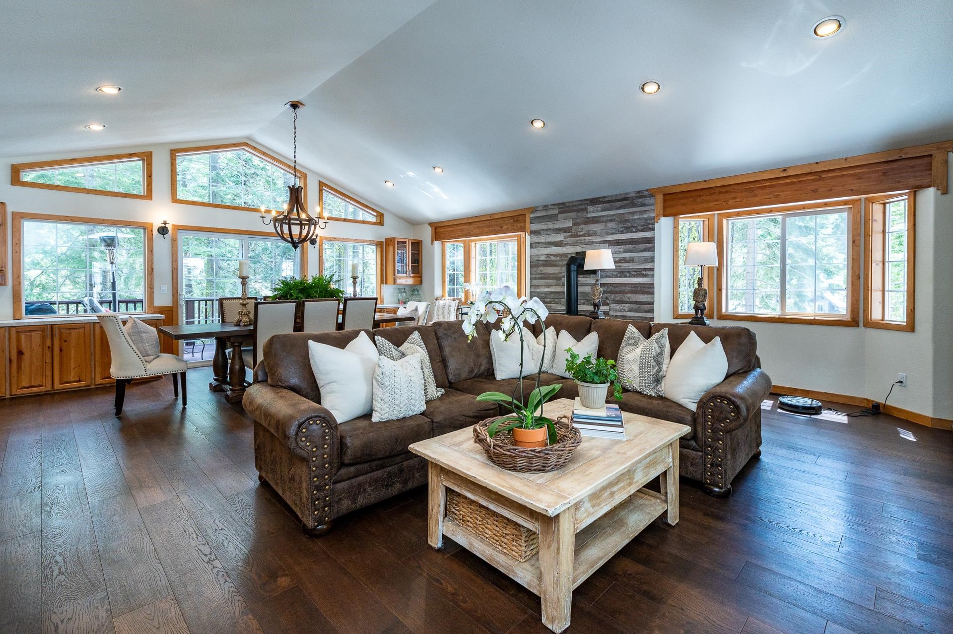 790 Sugar Pine Road Homewood, CA 96141 - Photo 5 of 21 a living room with furniture kitchen view and a large window