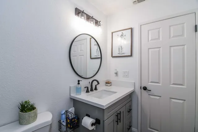 a bathroom with a shower and toilet