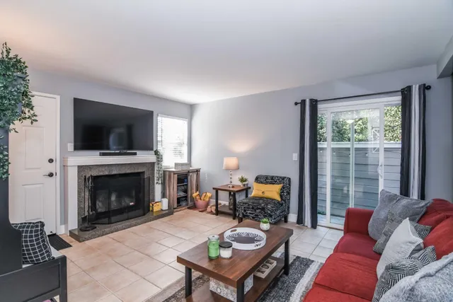 a living room with a fireplace in it