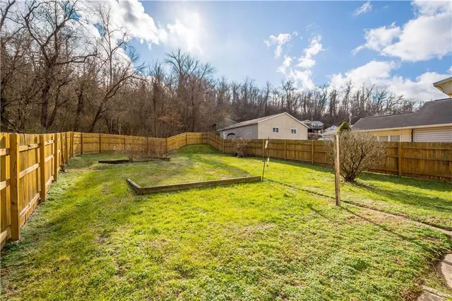 a view of a swimming pool with an outdoor space