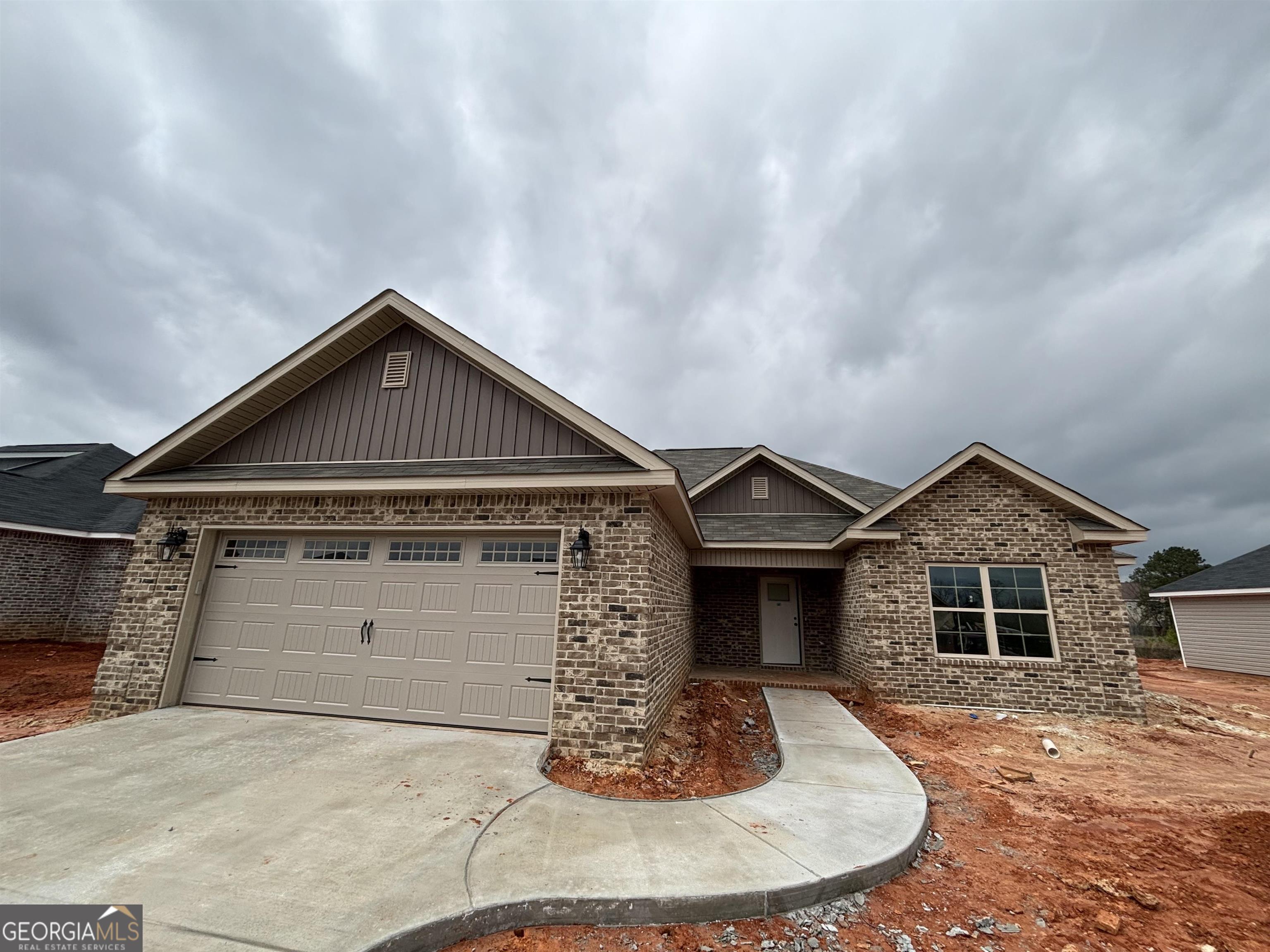 236 Overton Drive Perry, GA 31069 - Photo 1 of 1 a front view of a house with a yard