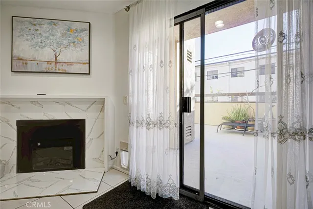 a view of a hallway with wooden shelves