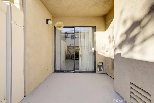 a view of a room with wooden walls