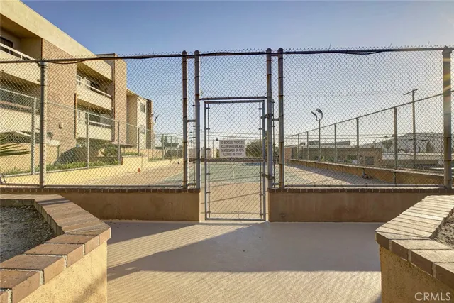 a view of living room with furniture and floor to ceiling window