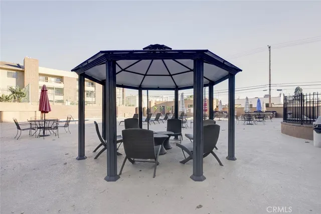 a view of a building with a yard