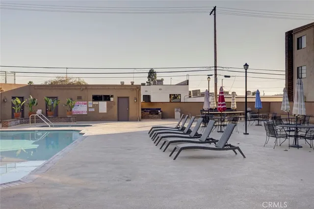 a view of a car park in front of house
