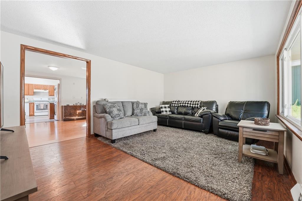 903 Ottawa Mercer, PA 16137 - Photo 19 of 42 a living room with furniture and a wooden floor