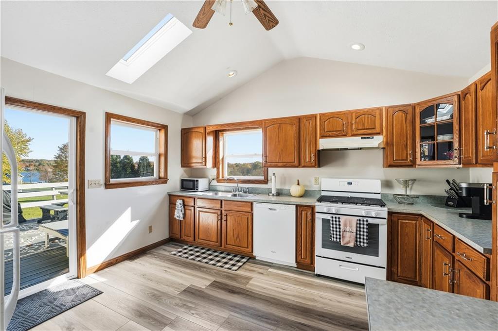 903 Ottawa Mercer, PA 16137 - Photo 24 of 42 a kitchen with stainless steel appliances granite countertop sink stove top oven and cabinets