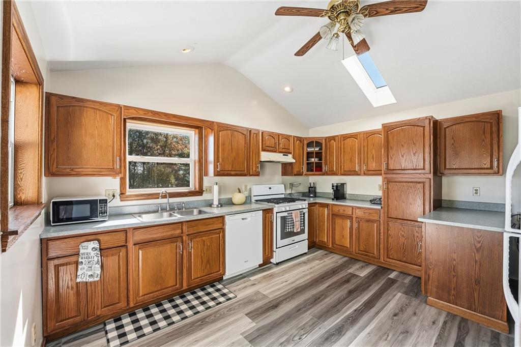 903 Ottawa Mercer, PA 16137 - Photo 25 of 42 a kitchen with stainless steel appliances granite countertop a sink and wooden cabinets