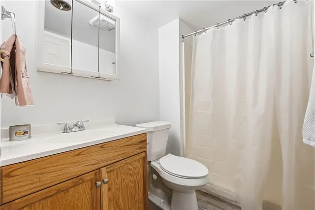 a view of a room with wooden walls