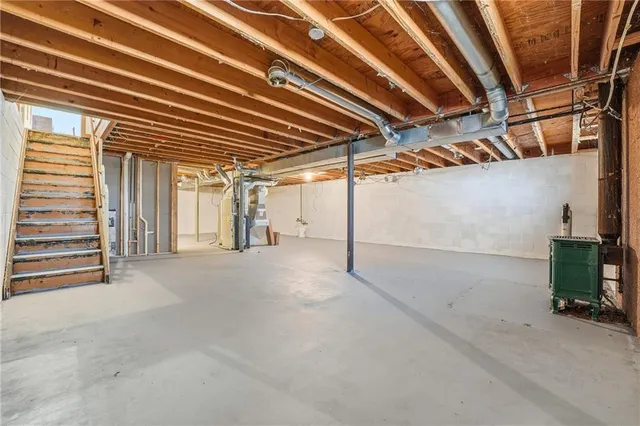 a view of a room with wooden walls