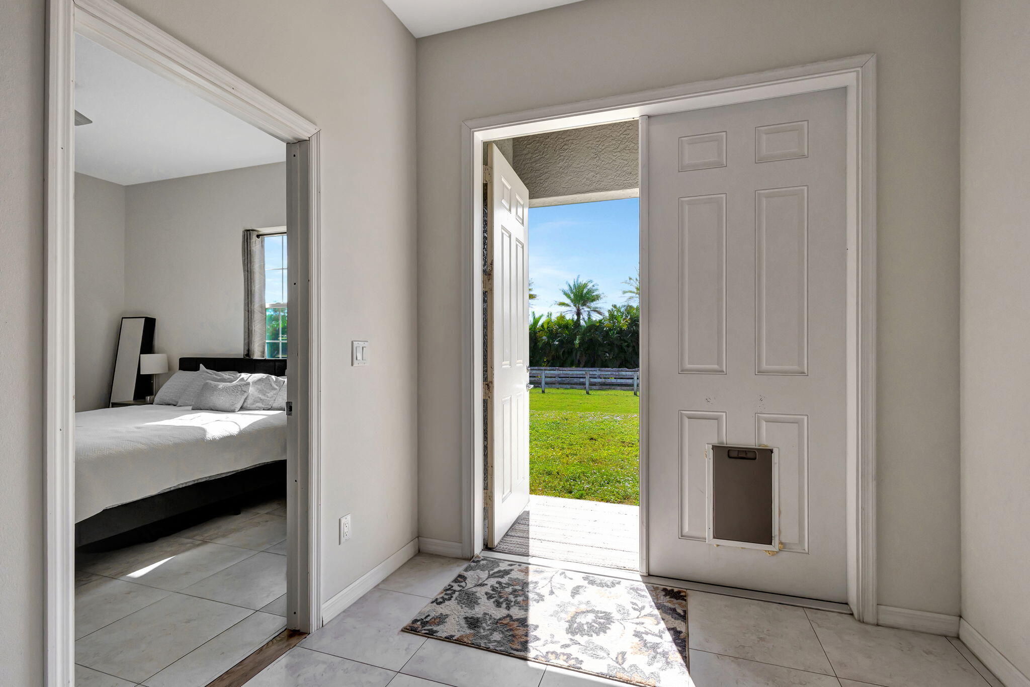 3560 Grande Road Loxahatchee, FL 33470 - Photo 28 of 48 Doors to Fenced Yard