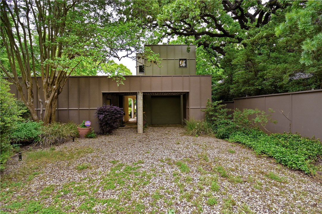 3508 Bridle Path Austin, TX 78703 - Photo 1 of 1 a front view of a house with a yard and garage