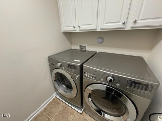 8203 Saltwood Place Raleigh, NC 27617 - Photo 19 of 24 a utility room with dryer and washer