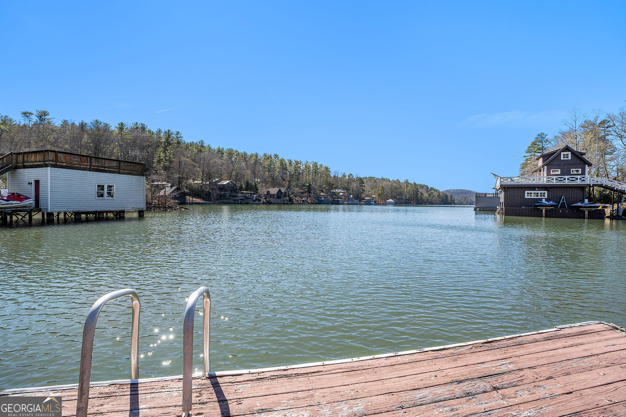 5622 Murray Cove Road Tiger, GA 30576 - Photo 28 of 39 a view of a lake with houses