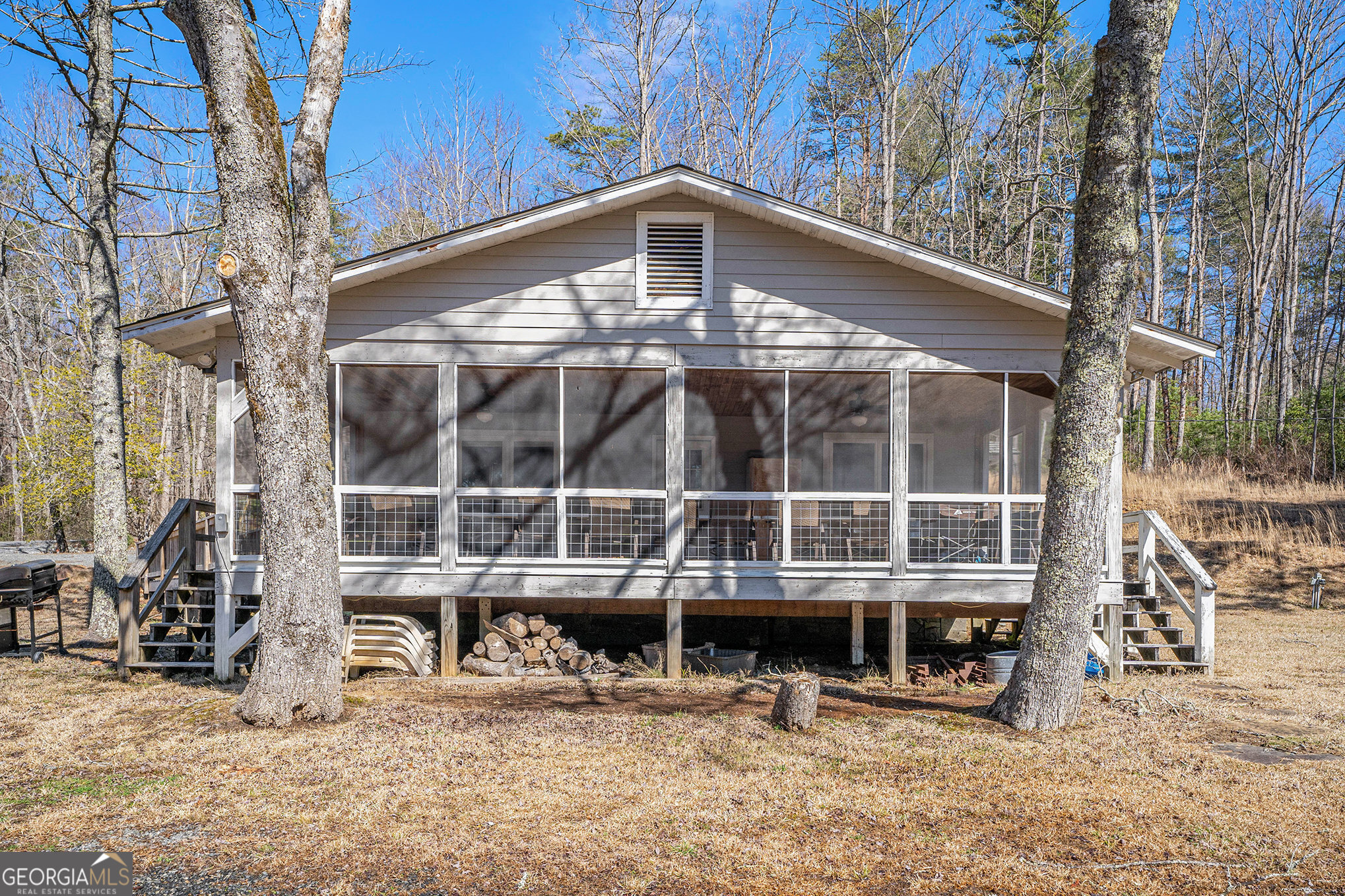 5622 Murray Cove Road Tiger, GA 30576 - Photo 29 of 39 a front view of a building with a lot of windows