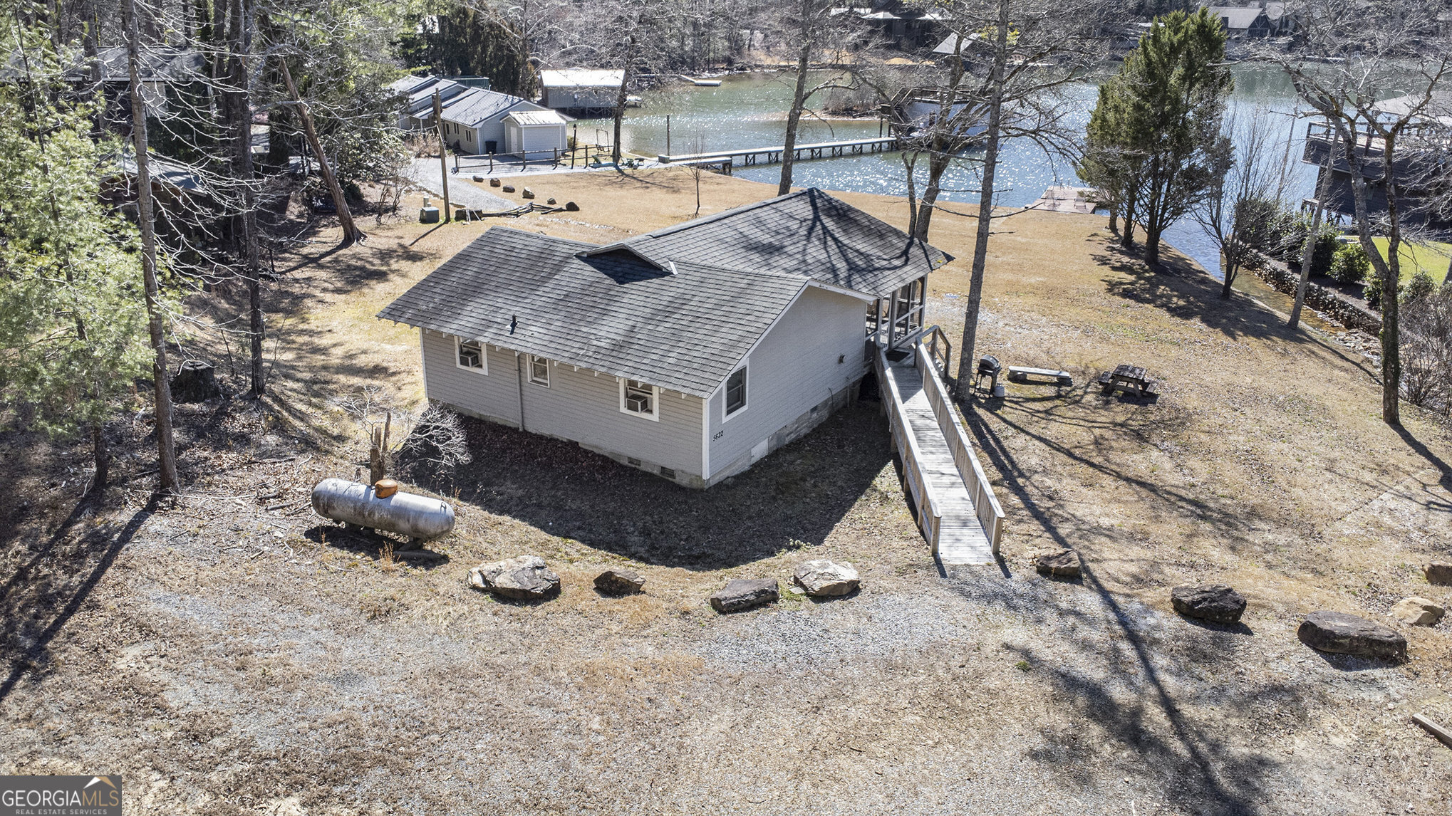 5622 Murray Cove Road Tiger, GA 30576 - Photo 34 of 39 a building with trees in the background