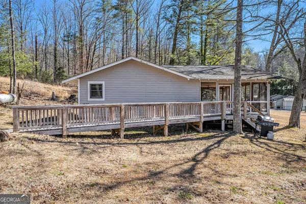a house with trees in front of it