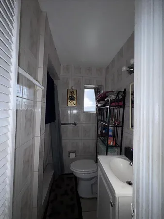 a bathroom with a sink and a toilet
