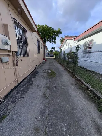 a view of a back yard of the house