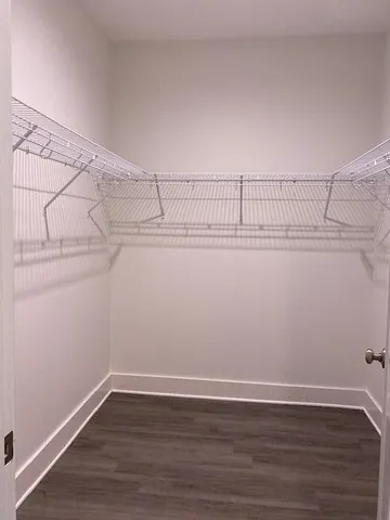 a bathroom with a double vanity sink mirror and shower