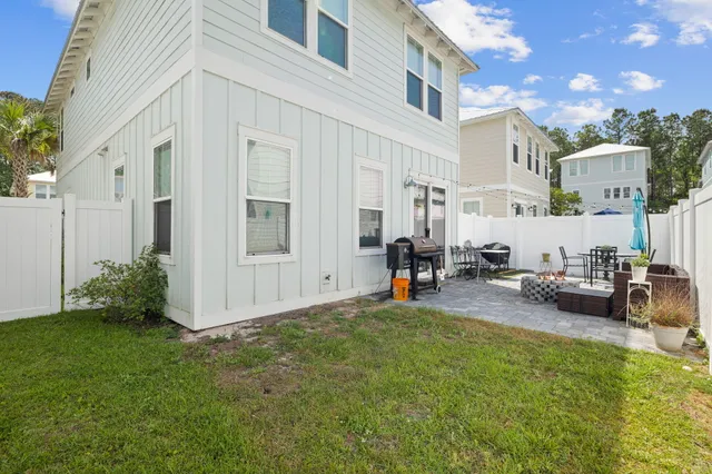 a aerial view of a house with swimming pool