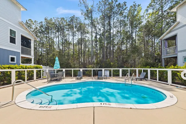 a view of yard with swimming pool