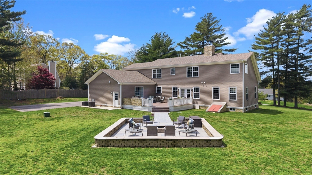 35 High Street Freetown, MA 02702 - Photo 10 of 40 a front view of house with garden and trees