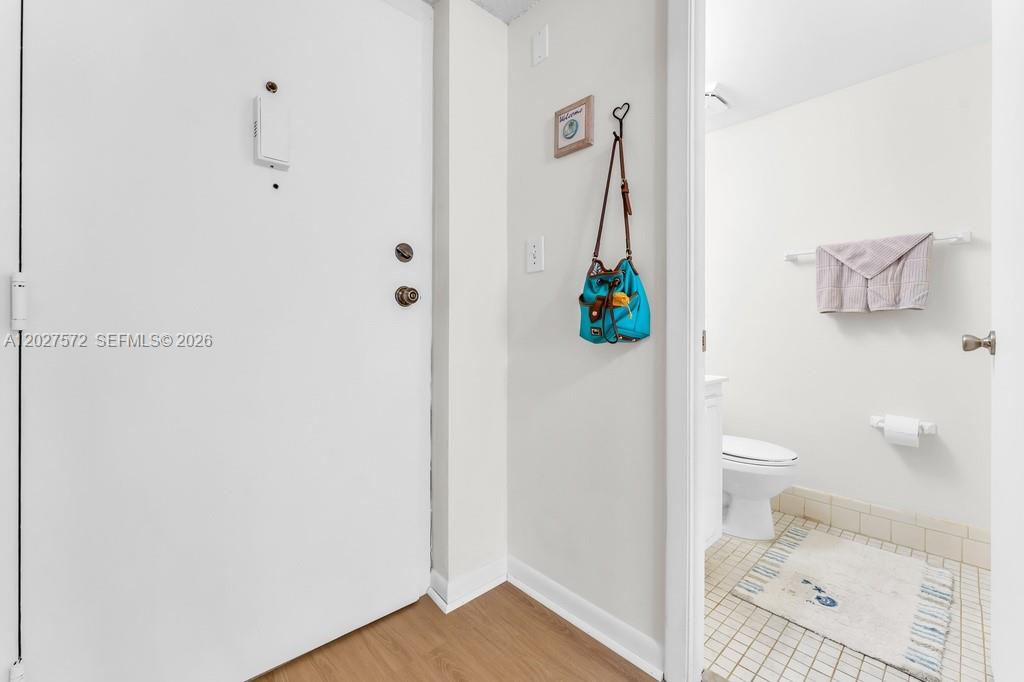 6600 Cypress Road, Unit 310 Plantation, FL 33317 - Photo 14 of 29 Half bath near entry & kitchen