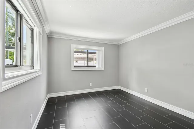 a view of a hallway with washer and dryer