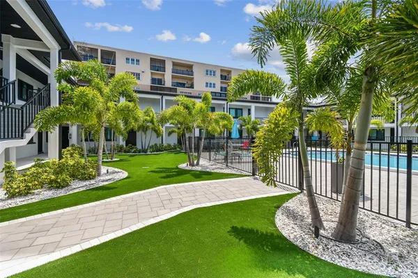 a view of swimming pool and outdoor seating