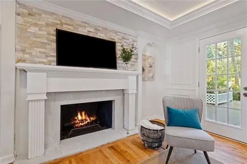 a kitchen with stainless steel appliances a stove microwave and cabinets
