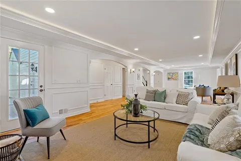a kitchen with granite countertop a sink and a stove