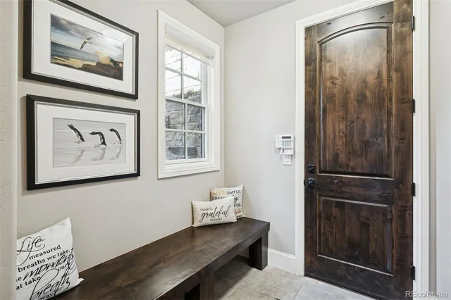 a hallway with a wooden floor and breakfast area