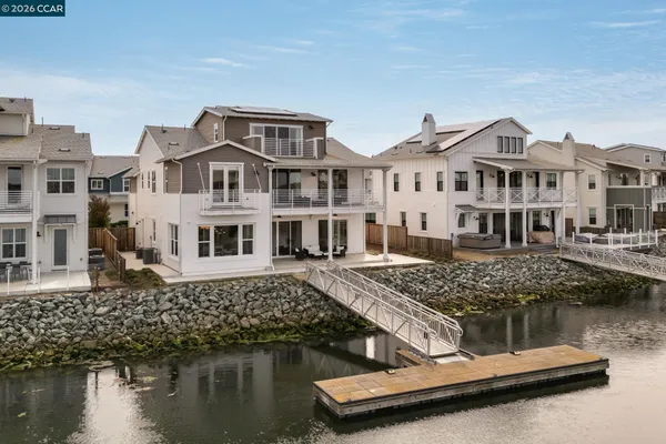 a house with river in front of it