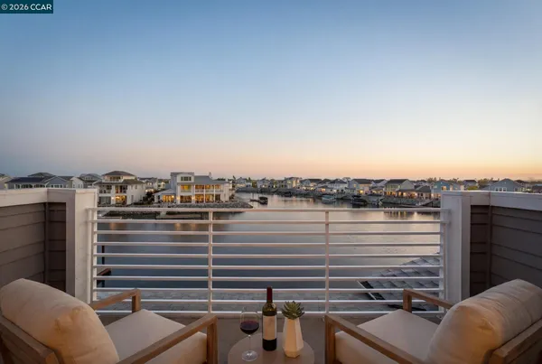 a view of a balcony with city view